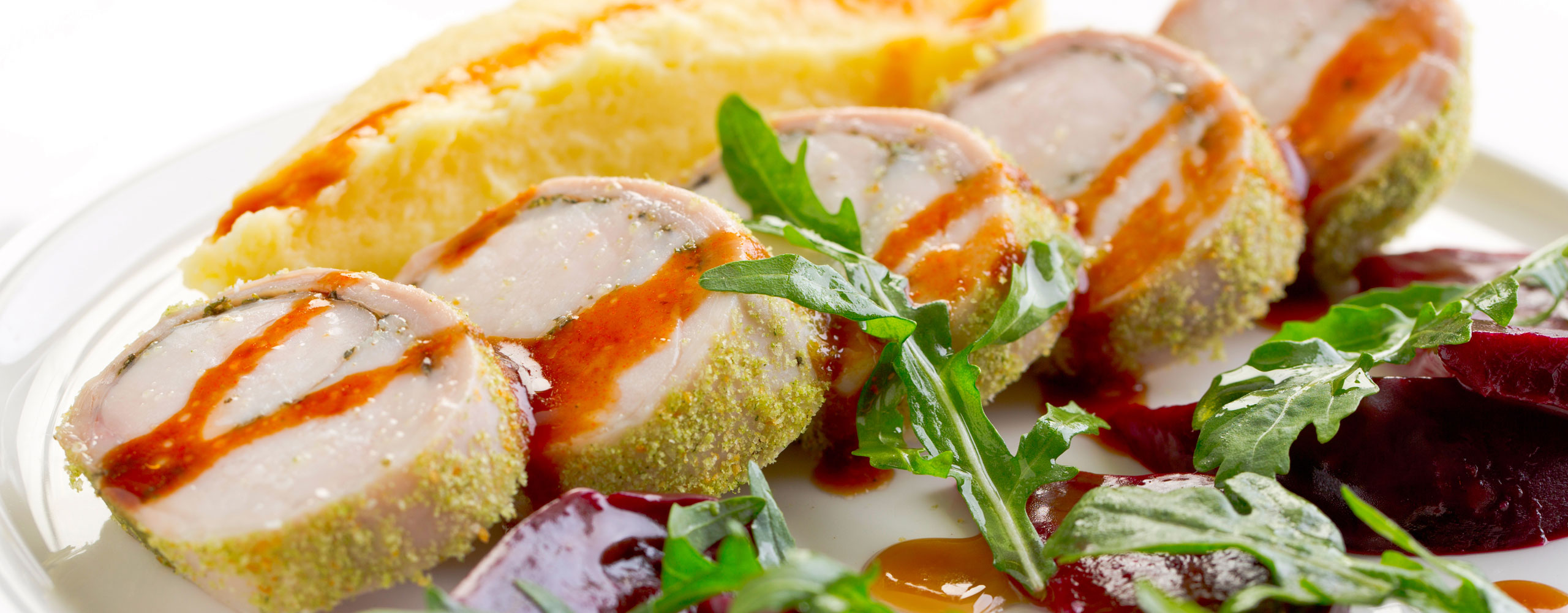 rolle di coniglio con granella di pistacchio