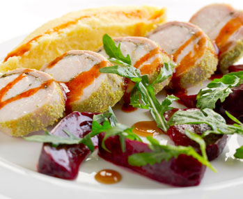 rolle di coniglio con granella di pistacchio